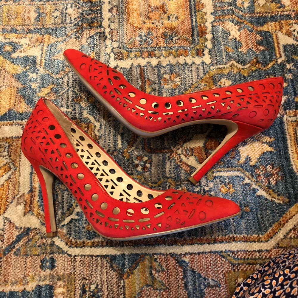 BCBGeneration leather laser cut red pumps